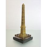 A late 19th century Grand Tour bronze model of the Luxor Obelisk, Paris, mounted on a square black