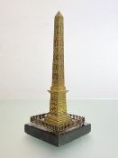 A late 19th century Grand Tour bronze model of the Luxor Obelisk, Paris, mounted on a square black