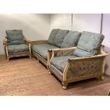 A cream and gilt-painted three piece bergere suite, 1920's, comprising a three-seat sofa, with