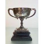 A George V silver twin-handled trophy, A. & J. Zimmerman, Birmingham 1934, the broad bowl on a