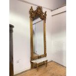 An imposing German pier mirror of Neo-Classical design, 19th century, the giltwood and gesso frame