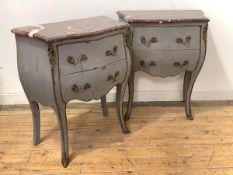 A pair of small bombe commodes in 18th century style, of serpentine outline, with breche violette