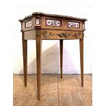 A French kingwood side table of serpentine outline, early 20th century, the quarter sawn and