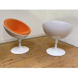 A pair of Fauteuil Soucoupe chairs, the white-lacquered moulded fibreglass frames upholstered in
