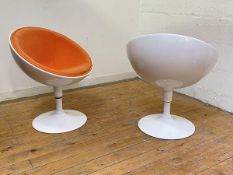 A pair of Fauteuil Soucoupe chairs, the white-lacquered moulded fibreglass frames upholstered in