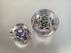 Two faceted millefiori paperweights, possibly Clichy: the larger with concentric rings of pink, blue