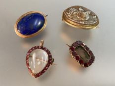 A group of 19th century brooches comprising: a rock crystal heart-shaped locket brooch/pendant,