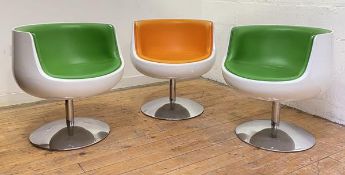After Eero Aarnio (Finland), a set of three "Cognac" chairs, the white lacquered moulded