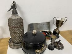 A mixed lot including two Epns trophies, an Epns wine coaster, a 1910-35 Jubilee souvenir tin, a