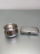 A 1935 Birmingham silver condiment pot (4cm) (34g), a cigarette box marked 900 (9cm) (68g) (2)