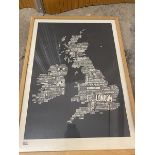 A modern print depicting the UK and Ireland formed of the various cities and towns in text,