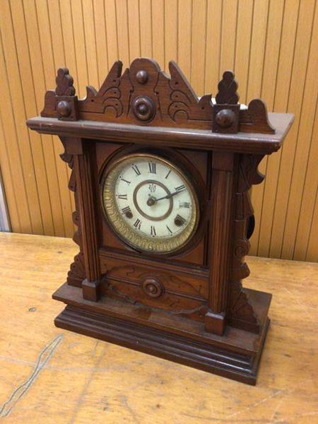 A Wren Waterbury Clock Company table clock with moulded case later adapted to electrical battery