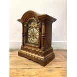 A Late 19th century German H.A.C. walnut cased bracket clock, the dial with gilt metal spandrels and