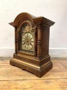 A Late 19th century German H.A.C. walnut cased bracket clock, the dial with gilt metal spandrels and