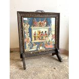 A Late 19th century embroidered fire screen depicting Scottish soldiers, surrounded by people of