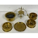 A collection of brassware including three artillery shell trench art bases for use as ashtrays (3.