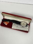 A gentleman's vintage Rotary stainless steel wristwatch with silvered dial and baton hour markers,