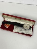A gentleman's vintage Rotary stainless steel wristwatch with silvered dial and baton hour markers,