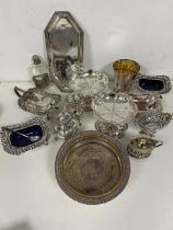 A quantity of silver plate including a wine coaster (5cm x 15cm), salts, condiment pot, flask,
