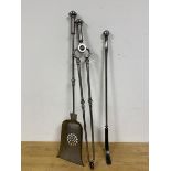 A set of three steel fire tools including tongs, shovel and curved poker (76cm)