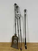 A set of three steel fire tools including tongs, shovel and curved poker (76cm)