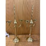 A pair of candelabra style brass table lamps each with two lamp holders on column style body measure