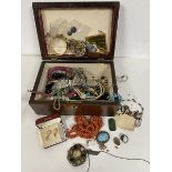 A quantity of costume jewellery including necklaces, earrings, rings, a rolled gold bangle, silver