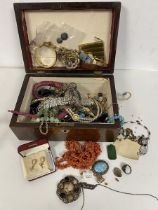 A quantity of costume jewellery including necklaces, earrings, rings, a rolled gold bangle, silver