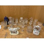 A quantity of glass including sherry glasses, also a decanter of bolster form, a milk jug in the