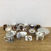 A mixed lot of china including a Victorian advertisement money bank including Coleman', Bovril and
