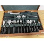 A Norwegian Brodrene Oyo cutlery canteen, with serving utensils, forks, knives, spoons, all with