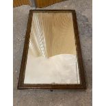 An Edwardian rectangular wall mirror, with parcel gilt frame (66cm x 41cm0