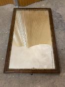 An Edwardian rectangular wall mirror, with parcel gilt frame (66cm x 41cm0