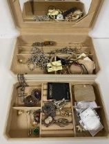 A mixed lot of costume and silver jewellery including a silver crucifix and chain (combined: 25g),