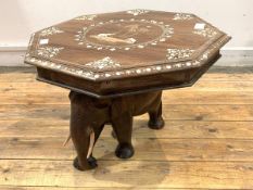 An Indian hardwood lamp table, the octagonal top with bone inlay depicting elephants and foliate,