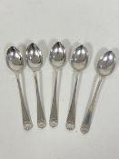 A set of five 1921 Sheffield silver coffee spoons, makers mark CB & S, with shell terminal (each: