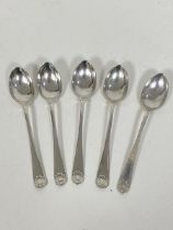 A set of five 1921 Sheffield silver coffee spoons, makers mark CB & S, with shell terminal (each: