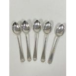 A set of five 1921 Sheffield silver coffee spoons, makers mark CB & S, with shell terminal (each: