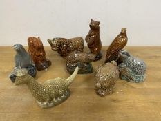 A collection of Beneagles Scotch Whisky figures, including a Haggis figure (7cm), Loch Ness monster,