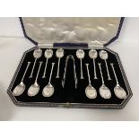A set of twelve 1923 Sheffield silver coffee spoons with sugar nips, in original presentation