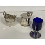 A 1915 Birmingham silver small milk jug (6cm) and an 1882 London silver condiment pot with blue