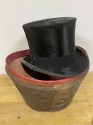 A gentleman's top hat, interior inscribed AJ White, Jermyn Street, St. James (interior: 54cm) and