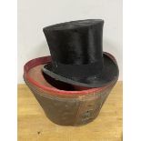 A gentleman's top hat, interior inscribed AJ White, Jermyn Street, St. James (interior: 54cm) and