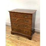 A Georgian style mahogany chest, the rosewood cross banded top over four graduated drawers, raised