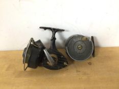 A vintage fishing reel inscribed J E WALKER NEWCASTLE UPON TYNE measures 3 x 7.5, another reel