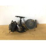 A vintage fishing reel inscribed J E WALKER NEWCASTLE UPON TYNE measures 3 x 7.5, another reel