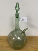 A glass cruet with stopper to top and spout to one side, with losses and with an aperture to
