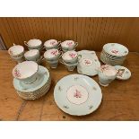 A Sutherland H&M tea set including fourteen tea cups, thirteen saucers, thirteen side plates, milk
