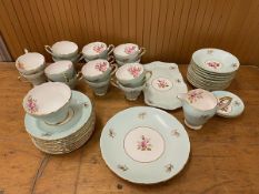 A Sutherland H&M tea set including fourteen tea cups, thirteen saucers, thirteen side plates, milk