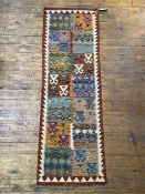 A Chobi Kilim runner rug of all over geometric design, 204cm x 66cm
